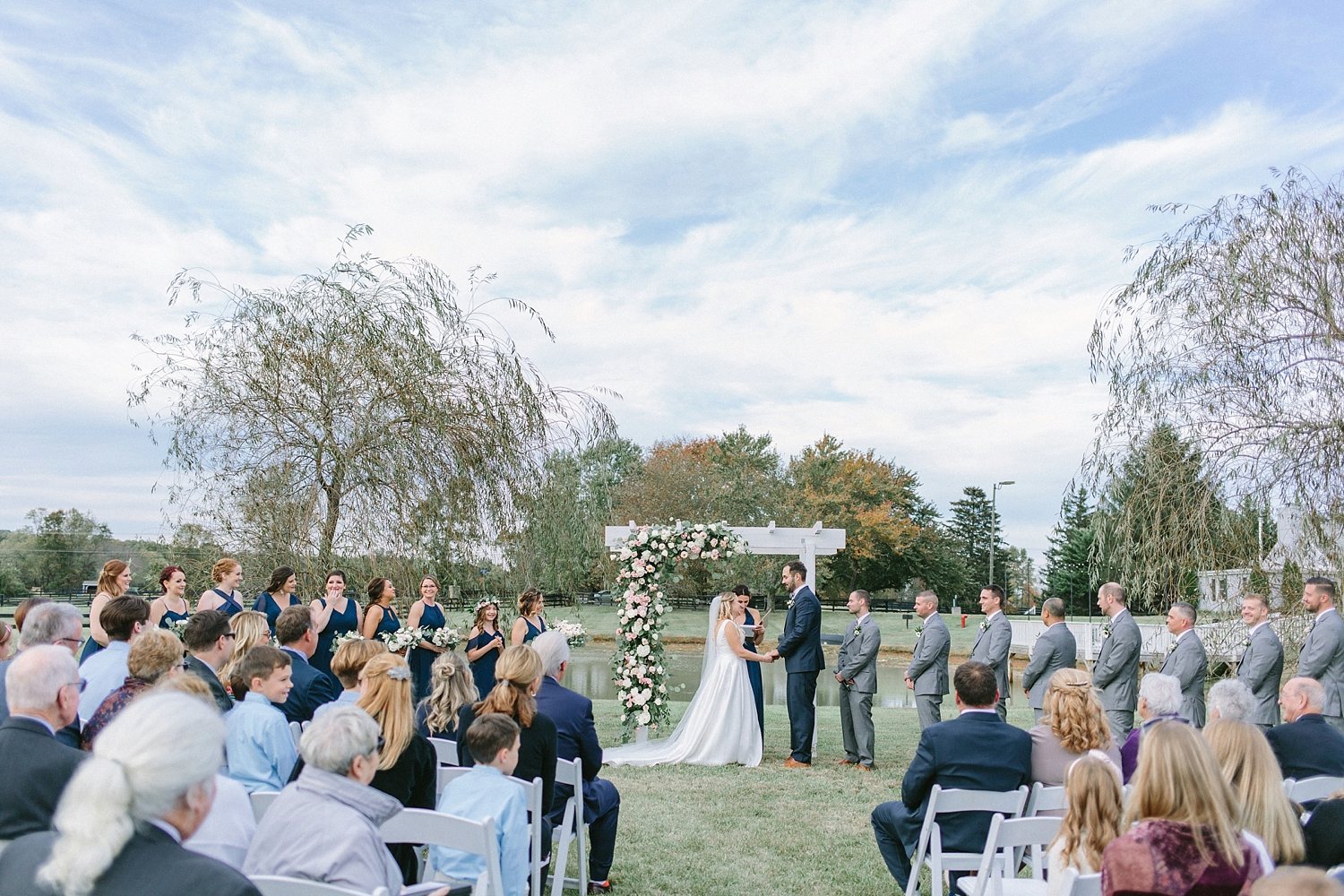 Wedding Ceremony between the willow trees at Middleburg barn